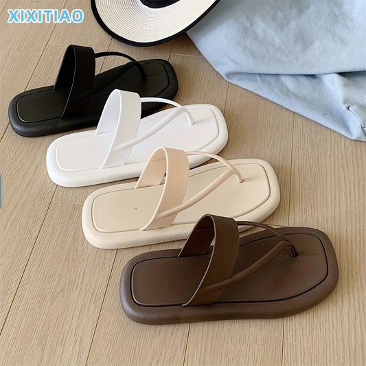 Women's solid color flip flops with soft PVC sole, lightweight and non-slip for casual seaside wear.