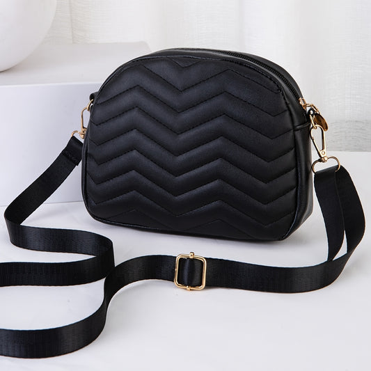 Stylish black crossbody bag with quilted chevron pattern and gold-tone hardware, featuring an adjustable shoulder strap and compact design for phone and essentials.