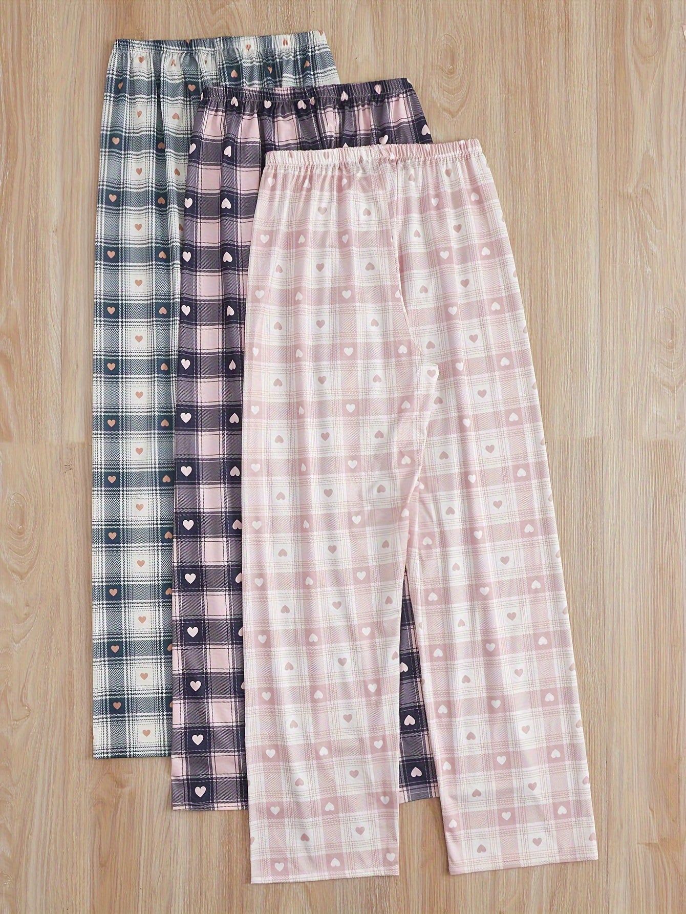 New arrival 3-pack women's printed plaid sleep pants for all seasons. Made of polyester with a front tie bow detail, perfect for summer and autumn home wear. Adult size, no belt included.