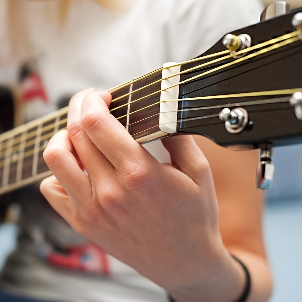 6-string acoustic guitar set with enhanced sound quality, easy maintenance, includes saddle, nut, and bridge pins in black & white, portable design for on-the-go repairs.