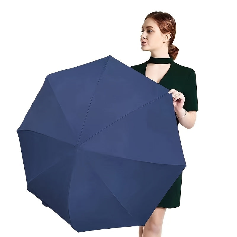 Stylish green compact automatic umbrella with windproof features for outdoor activities and daily use. Made with lightweight materials for easy portability.