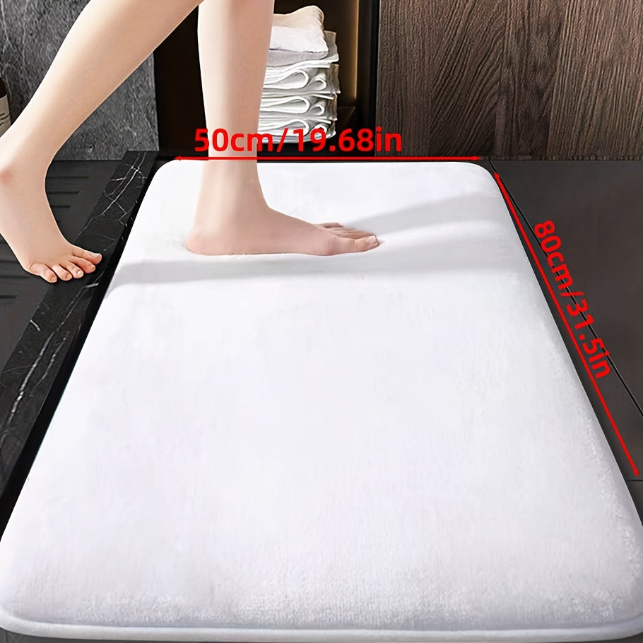 Soft and durable polyester bathroom mat with geometric design, ideal for shower, bathtub, bedroom, and living room. Versatile and non-slip, it is highly absorbent and machine washable.