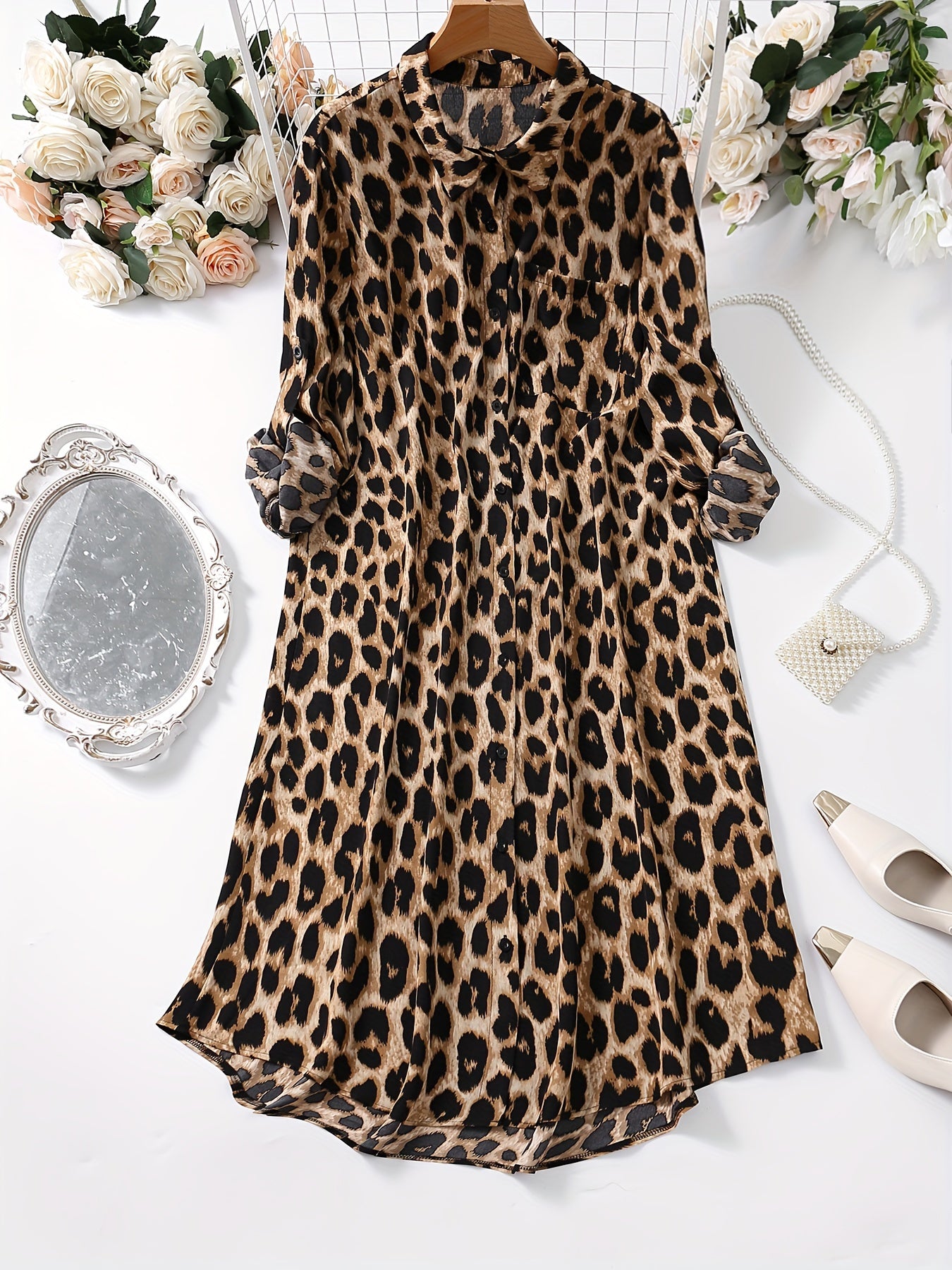 Leopard print button-up shirt dress with rolled sleeves, ideal for spring and autumn.