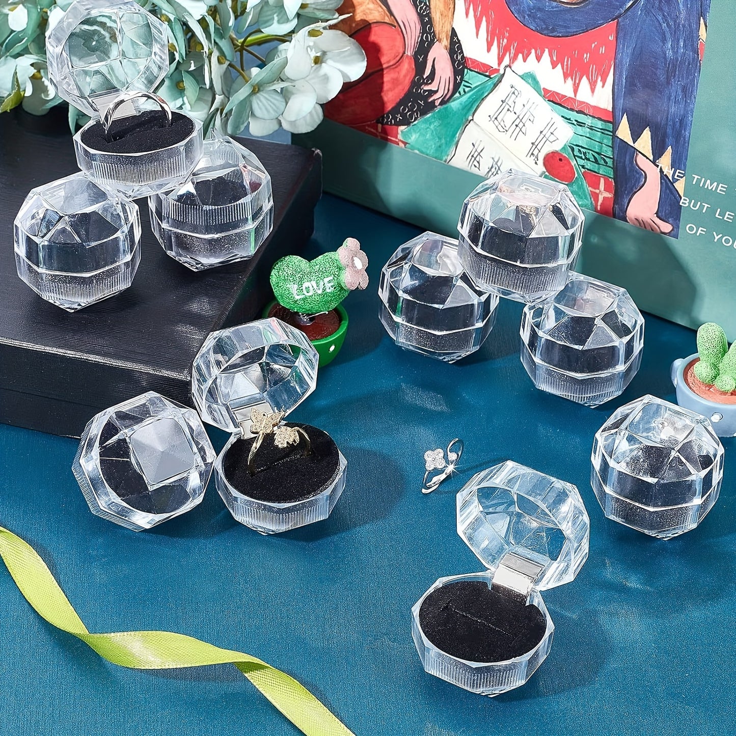 10 elegant octagonal crystal clear plastic ring boxes with metal interior - ideal for jewelry display, weddings, parties, and as jewelry boxes.