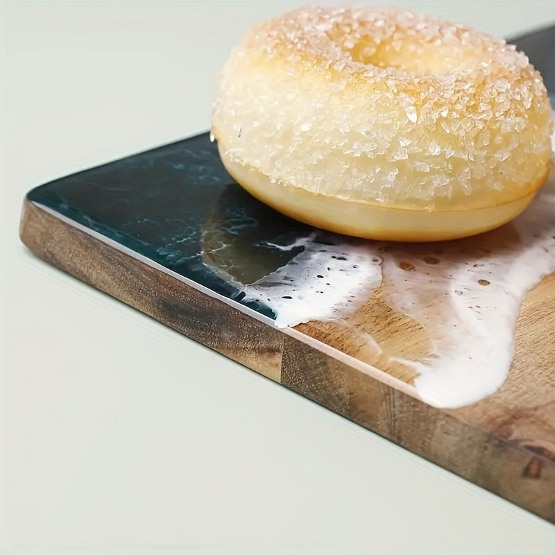 Get your hands on the stylish Wavy Resin Acacia Wood Cutting Board for home use. This creative cutting board is safe for food contact and perfect for slicing fruits and vegetables. Its unique wave design adds a touch of elegance to your kitchen, making