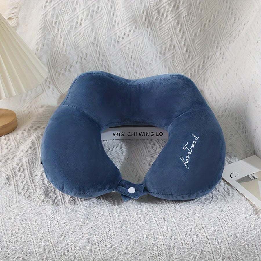 Soft and portable travel pillow in U shape, perfect for neck support on planes, trains, and cars. Ideal for a comfortable rest while traveling.