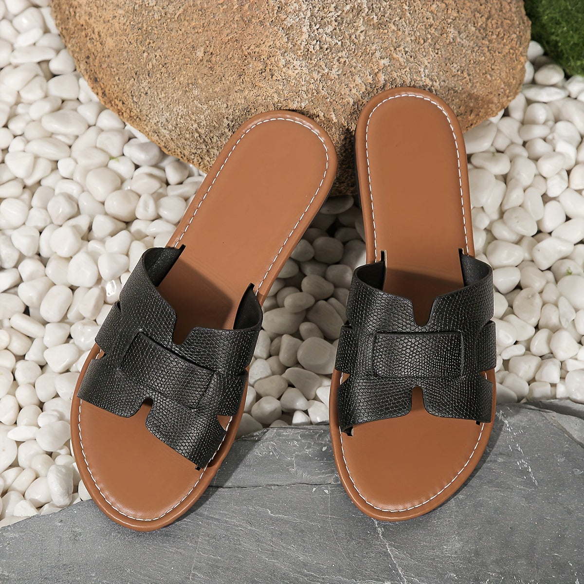 Flat slip-on sandals for women, minimalist style, all-season comfort, ideal for casual outdoor wear.