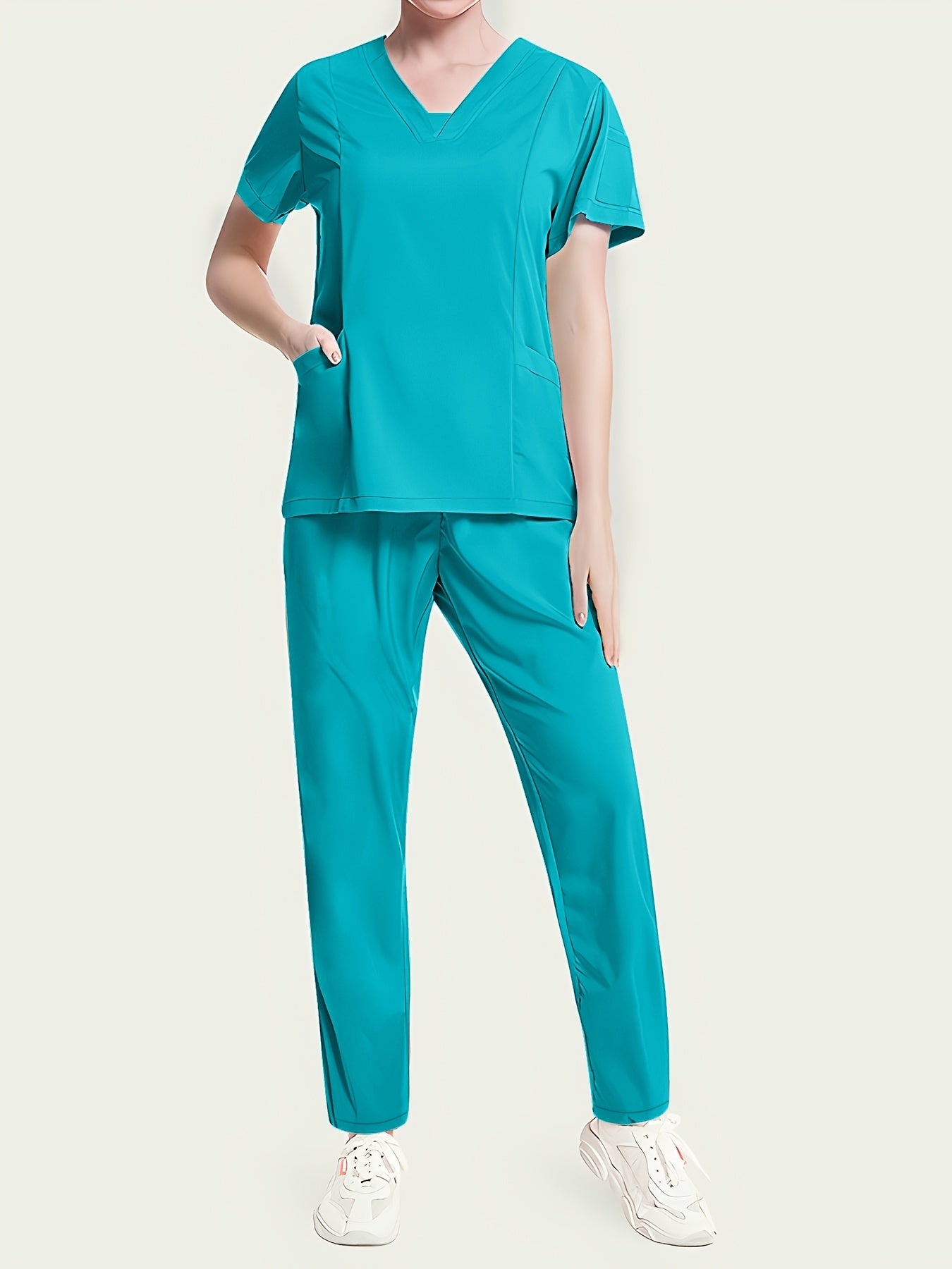 Mustahkam ayollar uchun jogger scrubs to'plami, V-shaklidagi yuqori qismi, tortishqoq shimlar va funksional cho'ntaklar - Sog'liqni saqlash mutaxassislari uchun ideal. Elastik va nafas oladigan polyester/spandeksdan tayyorlangan, mashinada yuvish mumkin.