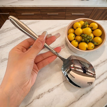 Sleek and durable stainless steel square spoon for buffet, dinner parties, and everyday use. Suitable for serving and cooking.