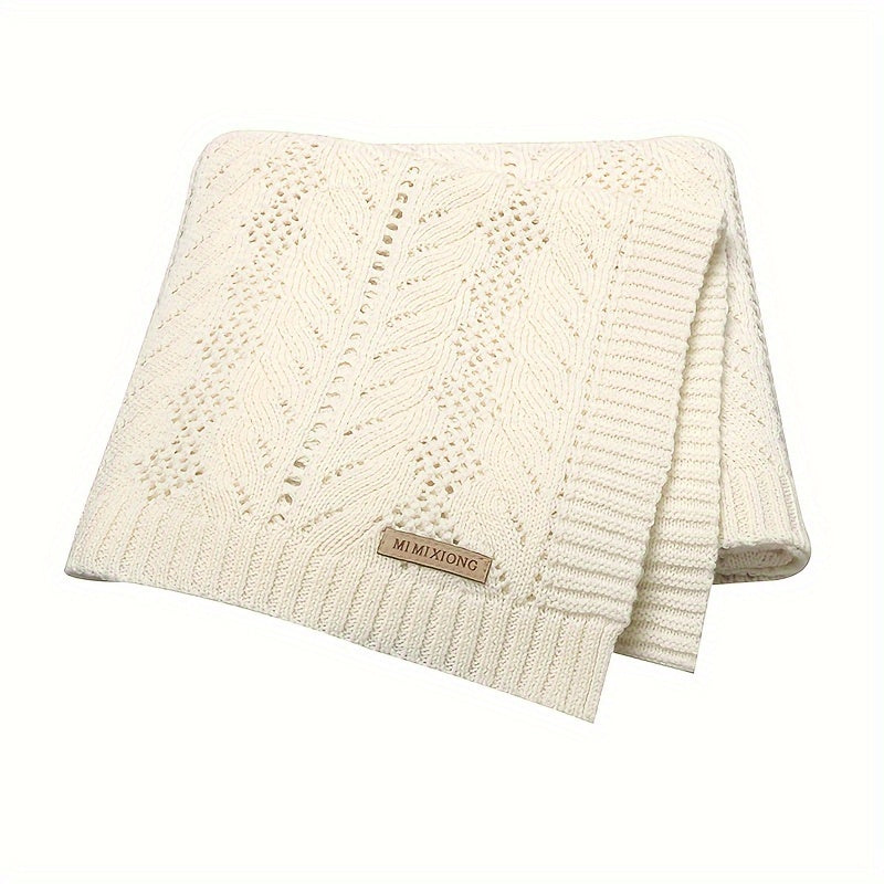 Youngsters Blanket made from soft knit material with a hollow-out design. This versatile air conditioning throw is perfect for use on the sofa, at home, or for parties. It can be hand washed and comes in bright pink, light blue, and cream colors.