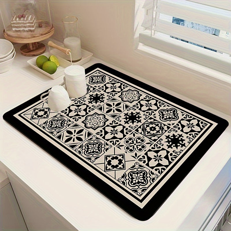 A necessary addition to any home, this retro-inspired printed tableware drying mat adds a touch of ethnic style to your kitchen. Perfect for keeping your kitchen utensils, coffee table, and coffee machine dry and clean, this versatile mat is a must-have