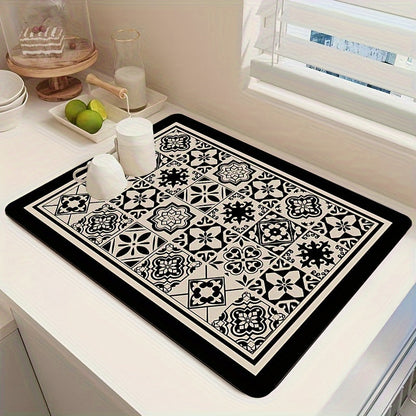 A necessary addition to any home, this retro-inspired printed tableware drying mat adds a touch of ethnic style to your kitchen. Perfect for keeping your kitchen utensils, coffee table, and coffee machine dry and clean, this versatile mat is a must-have