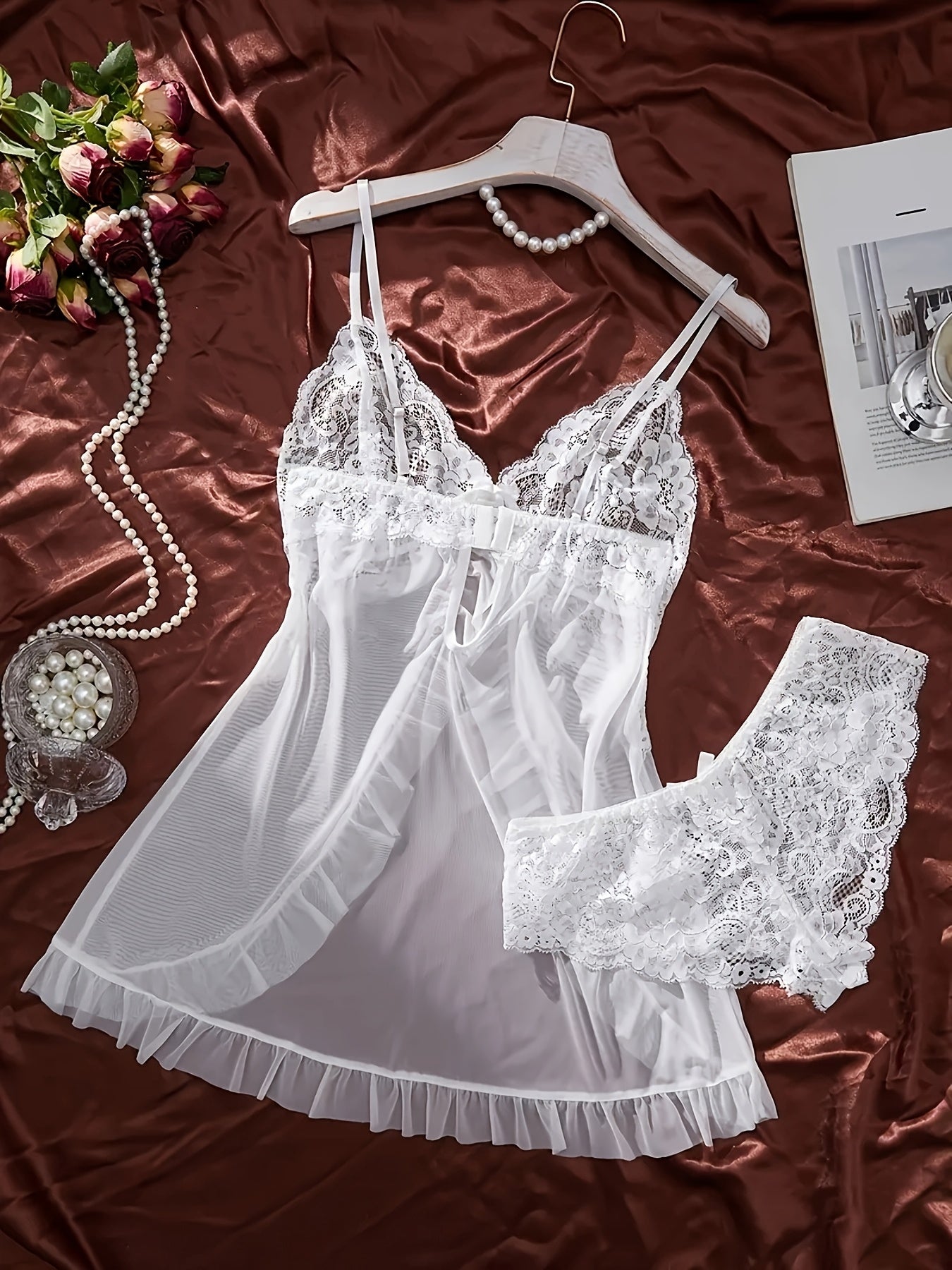 One-piece sexy lace nightdress for women made of polyester knit fabric with contrast lace detail.