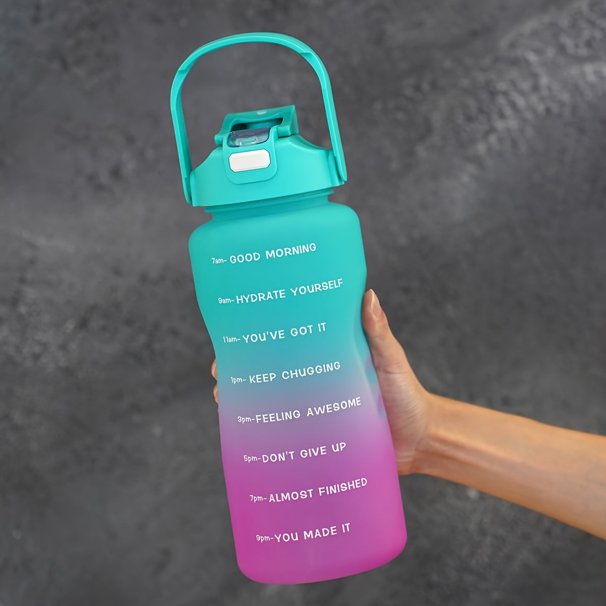 68oz gradient water bottle with motivational time markers, leak proof straw, ideal for running and sports, hand wash only, PVC free, great holiday gift option.