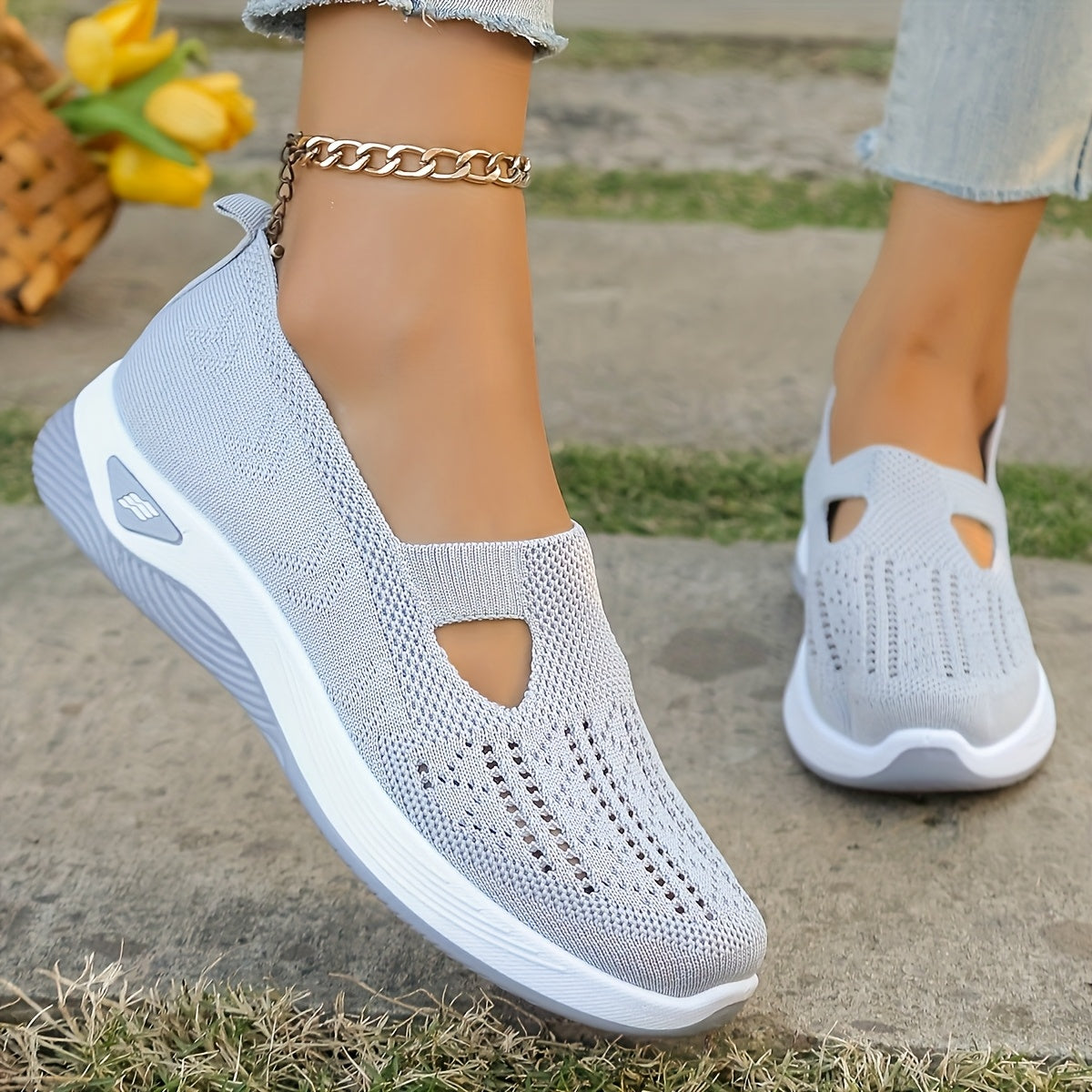 Breathable mesh slip-on sneakers with PVC sole, fabric insole, and lining for stability and comfort. Perfect for casual outdoor wear in spring and summer. Features cut-out patterns and