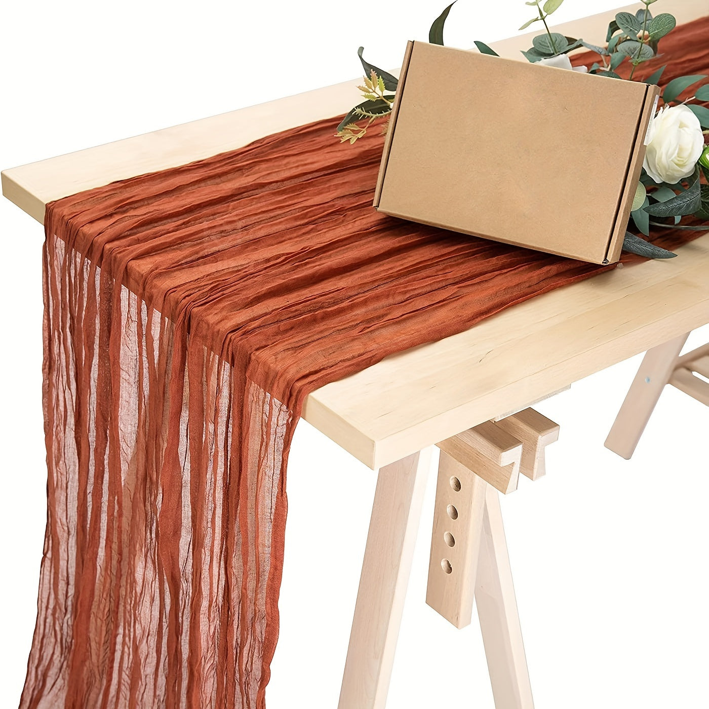 Polyester crinkle table runner for rustic wedding decor.