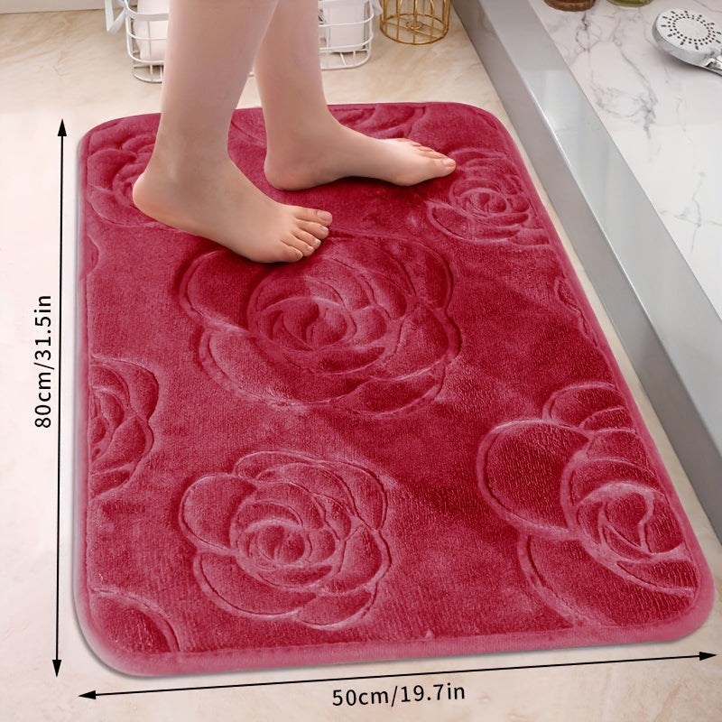 Soft and luxurious bath mat featuring a beautiful rose embossed design. This non-slip bathroom rug is made of ultra-soft knit polyester, providing superior comfort and absorbency. Lightweight and washable, this versatile mat is perfect for use in the