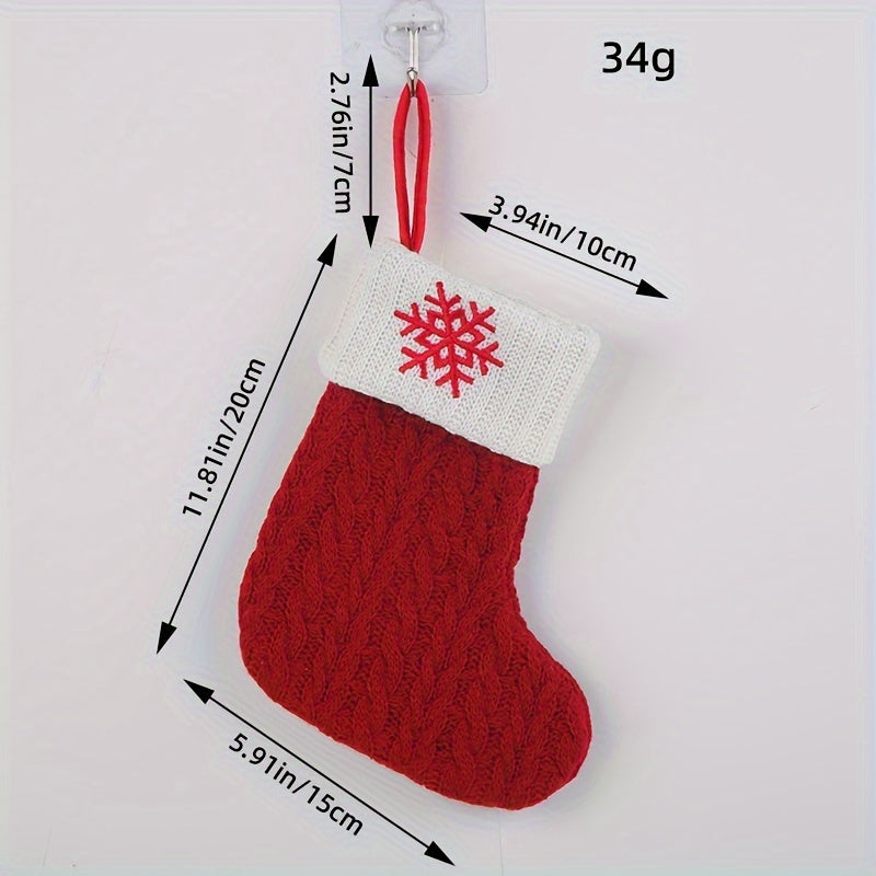 Knitted letter Christmas socks for home tree ornaments; red socks in gift bag for festive attire.