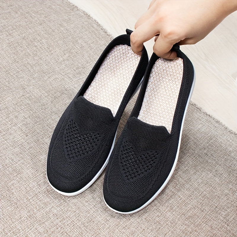 Women's slip-on flats with comfortable fabric upper, flax insole, and faux sole for easy daily wear.