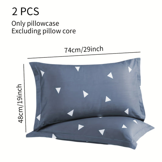 Two geometric triangle pillowcases made from soft, super fine fiber material. Features an envelope closure design and does not include pillow core. Each pillowcase measures 74cm/29in x 48cm/19in and is machine washable, colorfast, and durable. Perfect