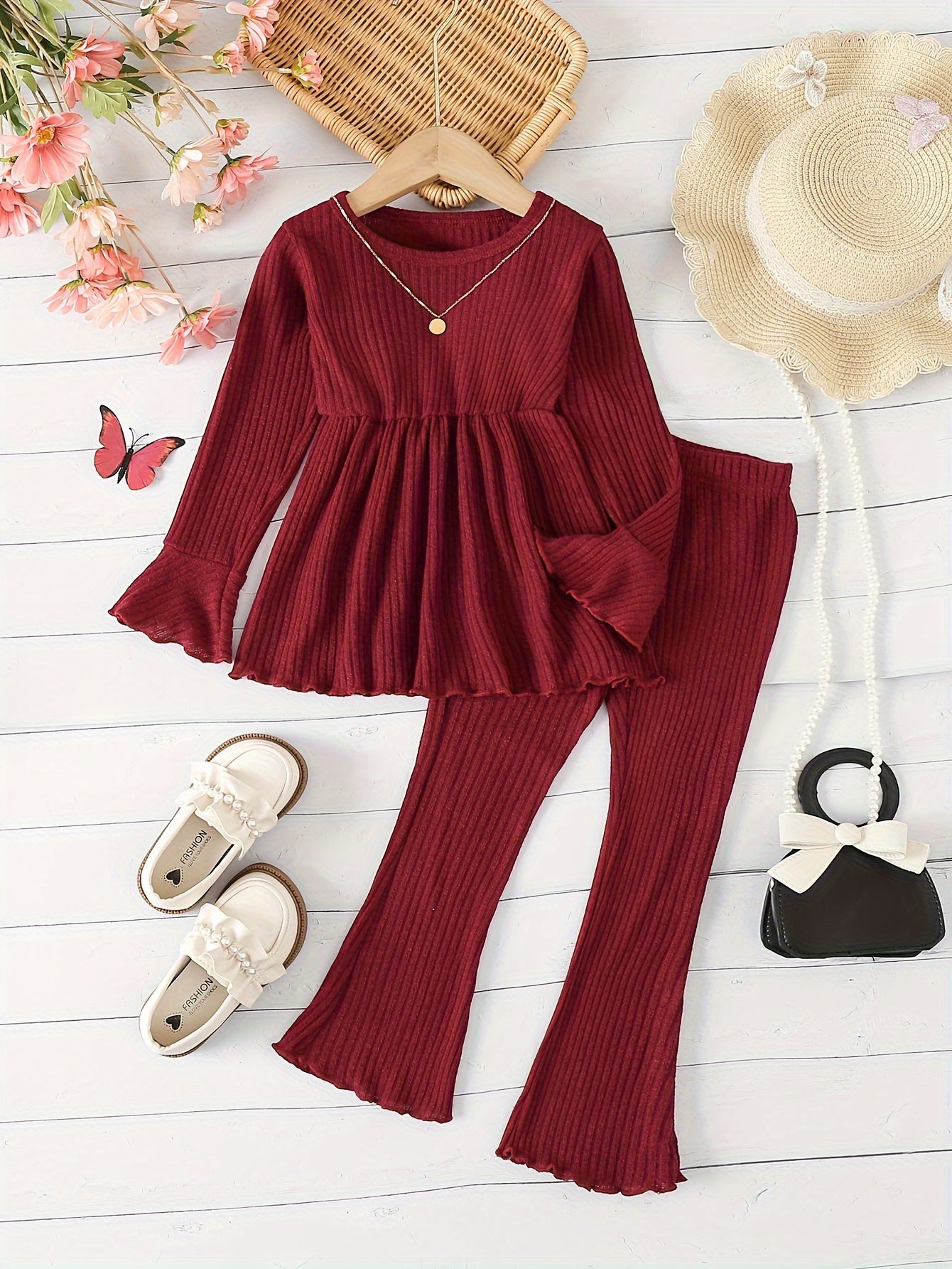 2-piece girls outdoor clothing set features solid color fashion pit stripe flared long sleeve top and pants.