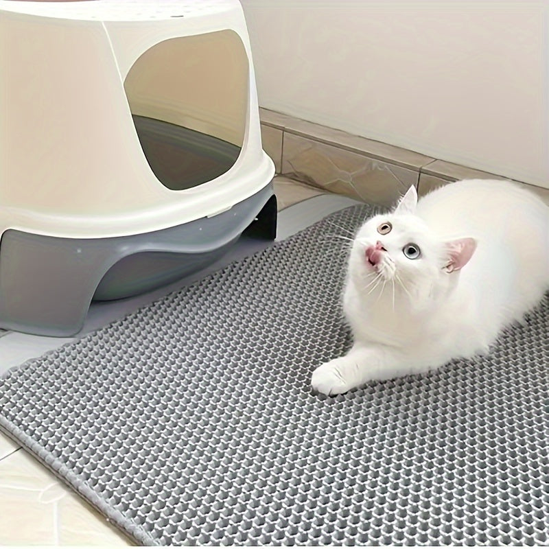 Large, double-layer cat litter mat with splash-proof EVA material, honeycomb design, and non-slip washable pad for pet toilets.