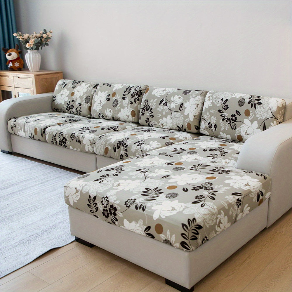 Waterproof flower printed sofa slipcover for furniture protection in various settings.