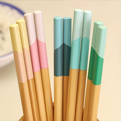 5 pairs of bamboo chopsticks that are antibacterial, anti-mold, anti-slip, carbonized, and high-temperature resistant. They are also reusable, lightweight, dishwasher safe kitchen supplies.