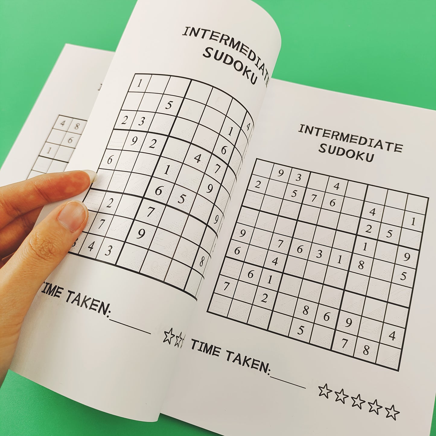 Sudoku book for ages 6-9, intermediate level brain teasers in English by Zhidian International (USA) LLC, 2024 edition