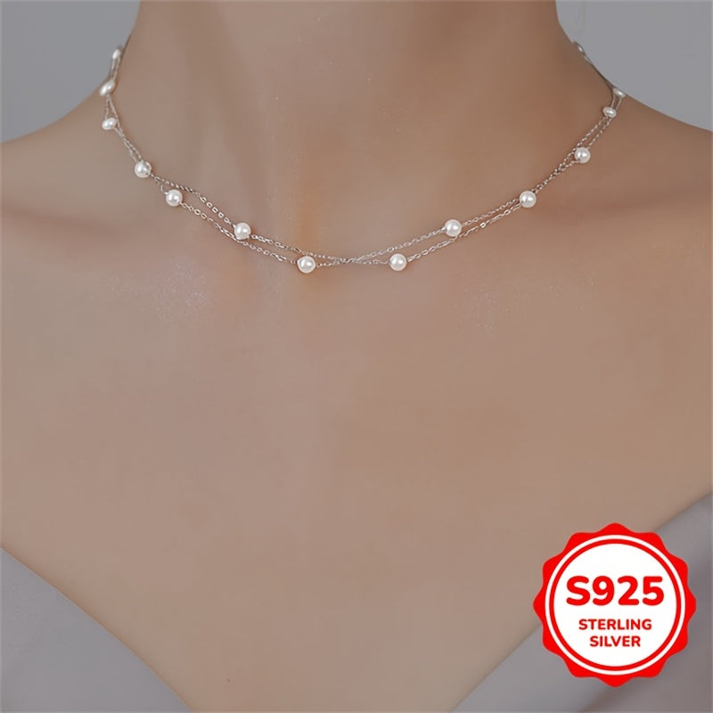 This double-layer pearl necklace is made of 3.02g of S925 sterling silver, giving it a simple and elegant look. The light luxury and high-end design make it perfect for women to wear as a clavicle chain. It is an ideal gift for birthdays, Mother's Day