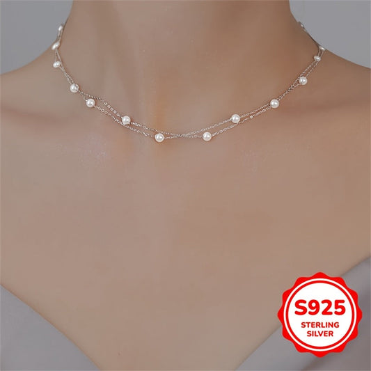 This double-layer pearl necklace is made of 3.02g of S925 sterling silver, giving it a simple and elegant look. The light luxury and high-end design make it perfect for women to wear as a clavicle chain. It is an ideal gift for birthdays, Mother's Day