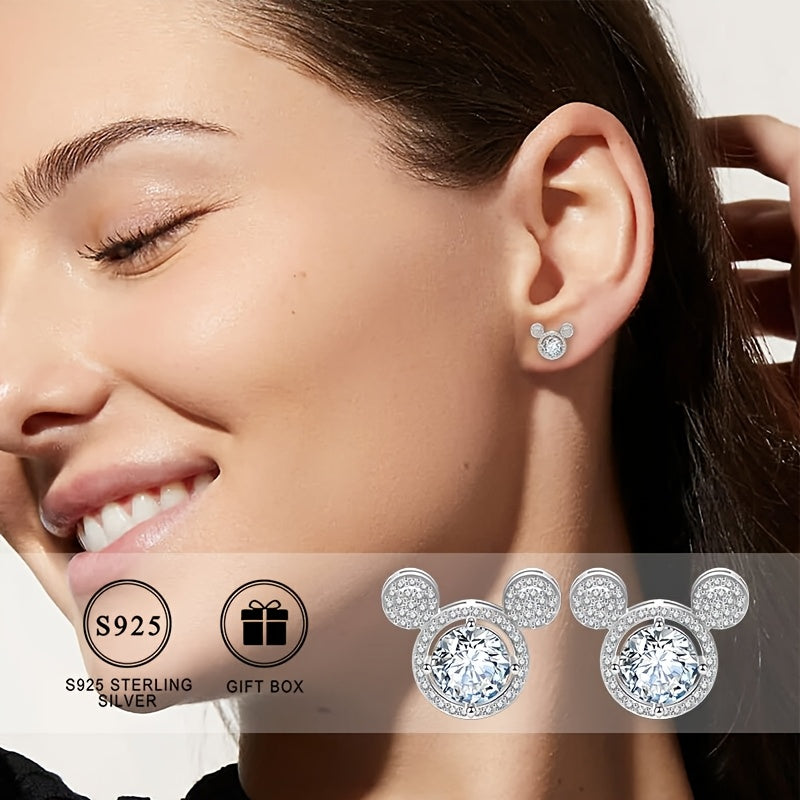 Add a touch of elegance and sexiness with these stunning 925 Sterling Silver earrings featuring a cute Mickey design accented with sparkling cubic zirconia. These large studs are perfect for both daily wear and special occasions. The silver plated