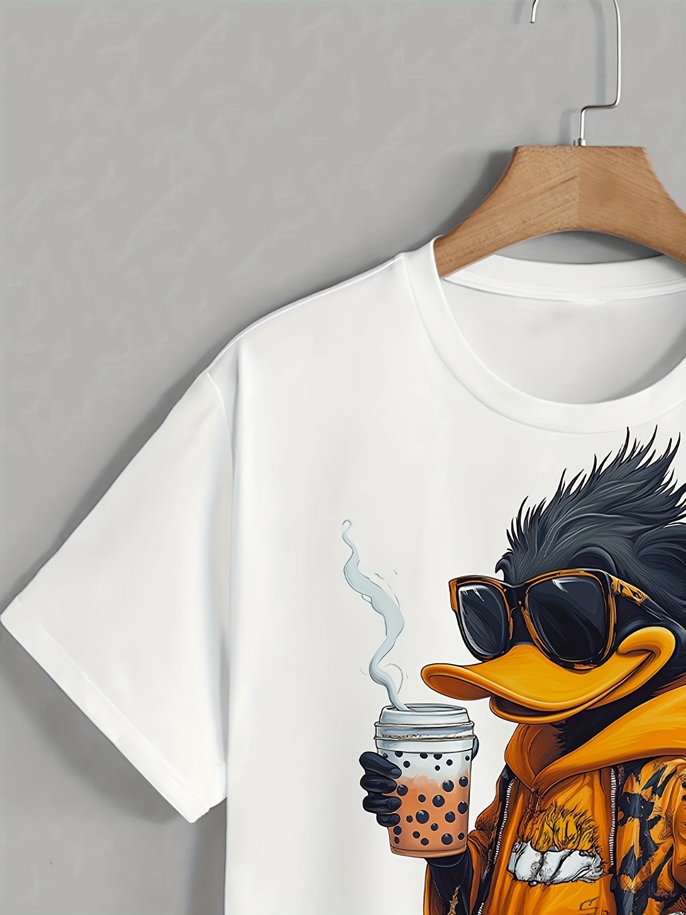 Men's graphic print T-shirt with short sleeves, crew neck, and stylish cartoon design. Suitable for daily wear and outdoor activities, made from durable polyester fabric. Trendy and