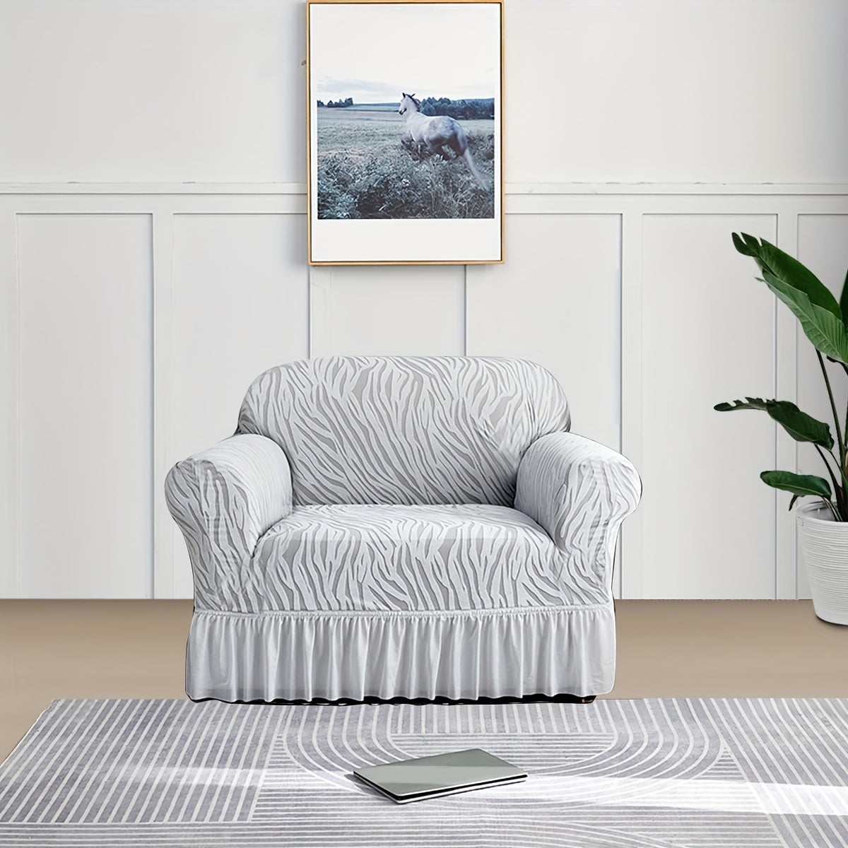 Wave pattern sofa slipcover with skirt, non-slip and dustproof. Protects furniture from cat scratches. Machine washable for easy cleaning. Suitable for bedroom, office, or living room décor.