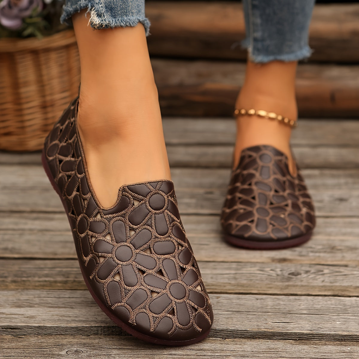 Stylish women's slip-on flats feature embroidered flowers, faux leather, breathable hollow design, and soft sole for year-round wear.