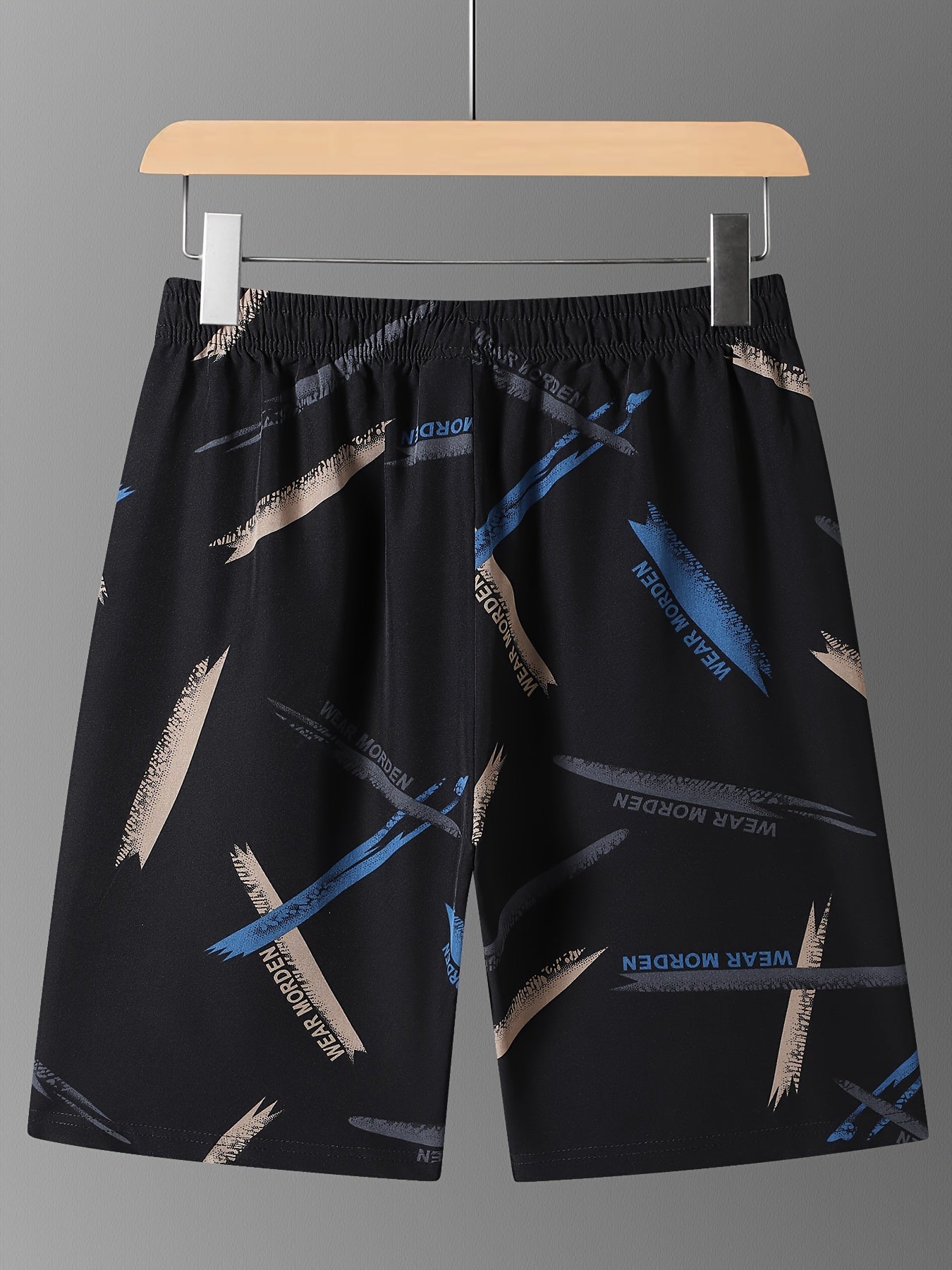 Men's summer knee-length shorts made of breathable polyester (92%) and spandex (8%) fabric with a unique print. Ideal for leisure activities, fashionable and trendy.