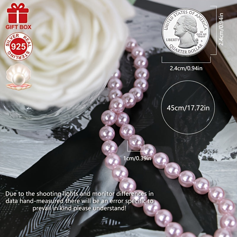 This stunning Cherry Blossom Pink Shell Pearl Necklace is crafted with hypoallergenic 925 Sterling Silver and features a vintage charm clasp. It makes the perfect gift for her and comes beautifully presented in an elegant gift box, making it ideal for