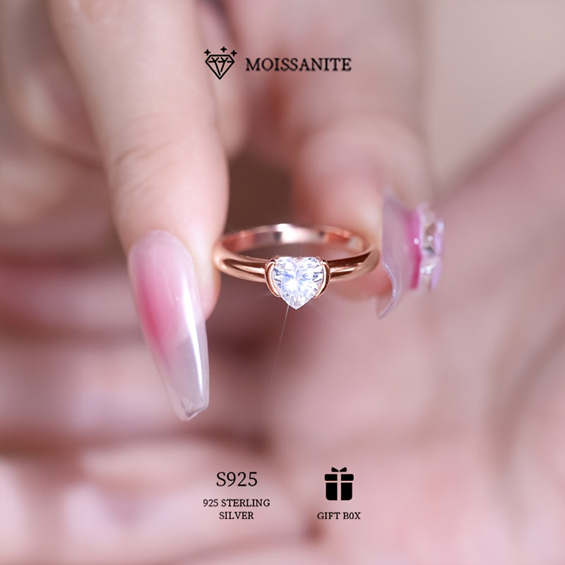 Vintage heart-shaped moissanite engagement ring in 1ct, crafted with 925 sterling silver plating. Hypoallergenic and comes in an elegant gift box, perfect for party and holiday gifting. Ideal for special occasions.