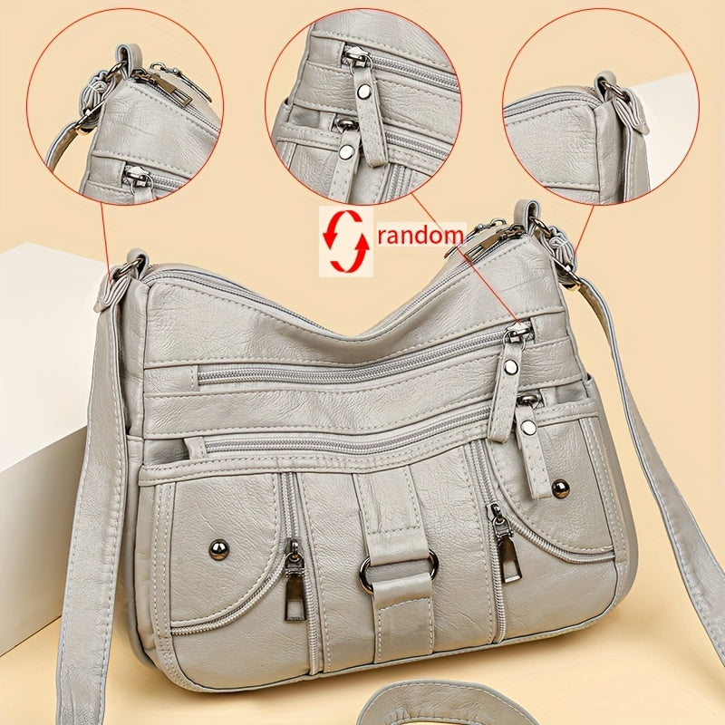 Women's synthetic leather crossbody bag with adjustable strap and anti-theft zipper closure. Large capacity with polyester lining, solid color, and multi-pocket design. Ideal for everyday