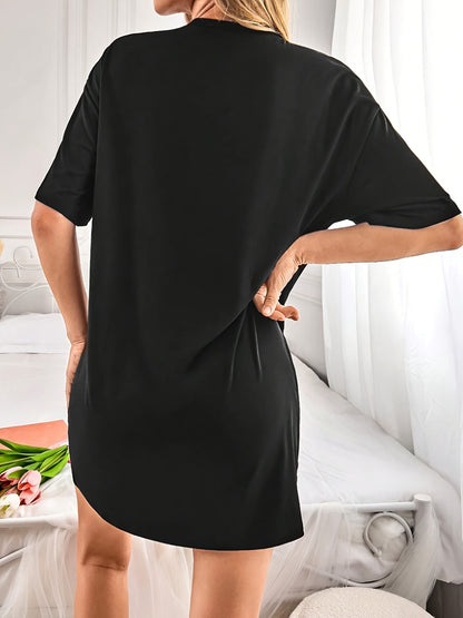 Casual sleepwear dress with slogan print, short sleeves, and round neck for comfortable nightwear.