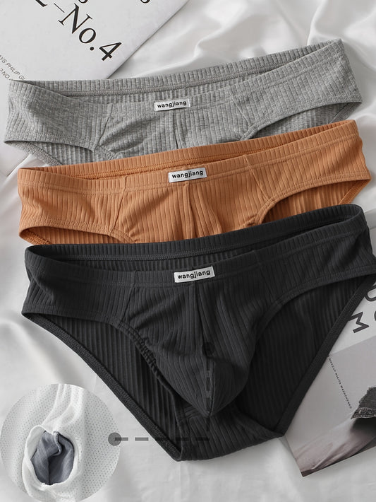 Set of 3 cotton briefs for men in solid colors, with comfort stretch fit.