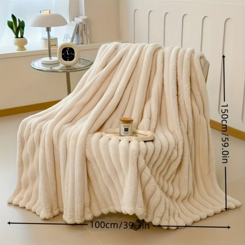 This elegant imitation rabbit fur shawl blanket is crafted from 100% polyester, featuring a soft knit fabric that provides all-season comfort. Versatile for use on the sofa, bed, in the office, or while traveling, this contemporary striped design is sure