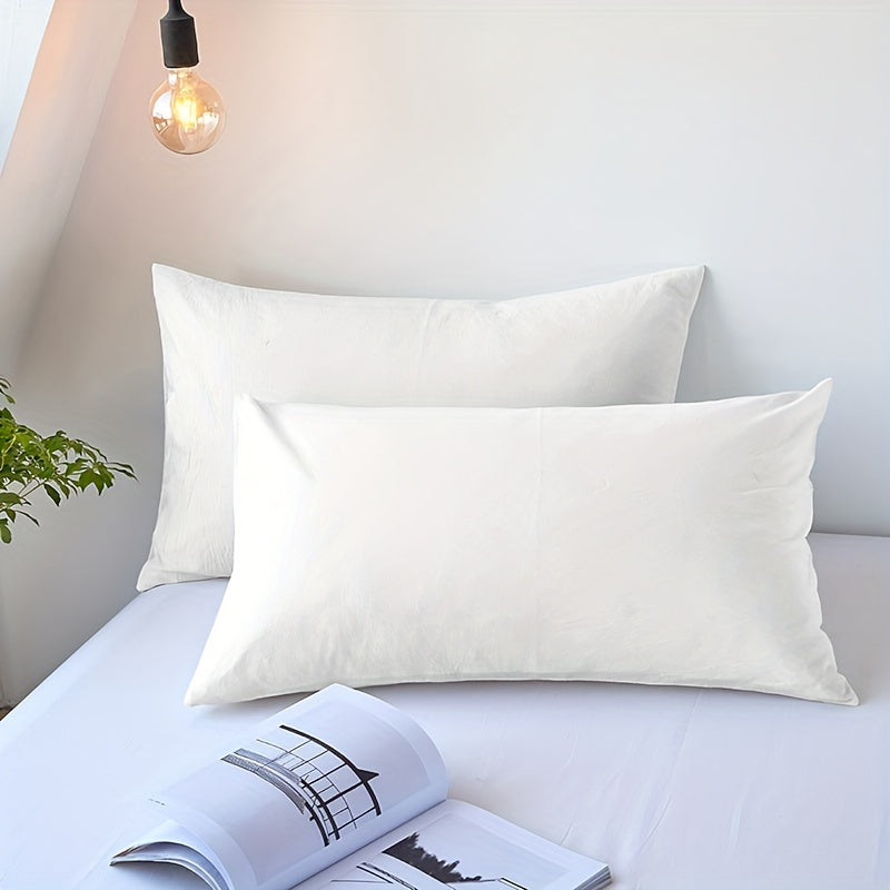 Choose from three different colors - Pure White, Gray, or Navy Blue, with this set of two solid color versatile pillowcases. Made from soft and breathable material with a frosted treatment, these pillowcases are machine washable and come without any