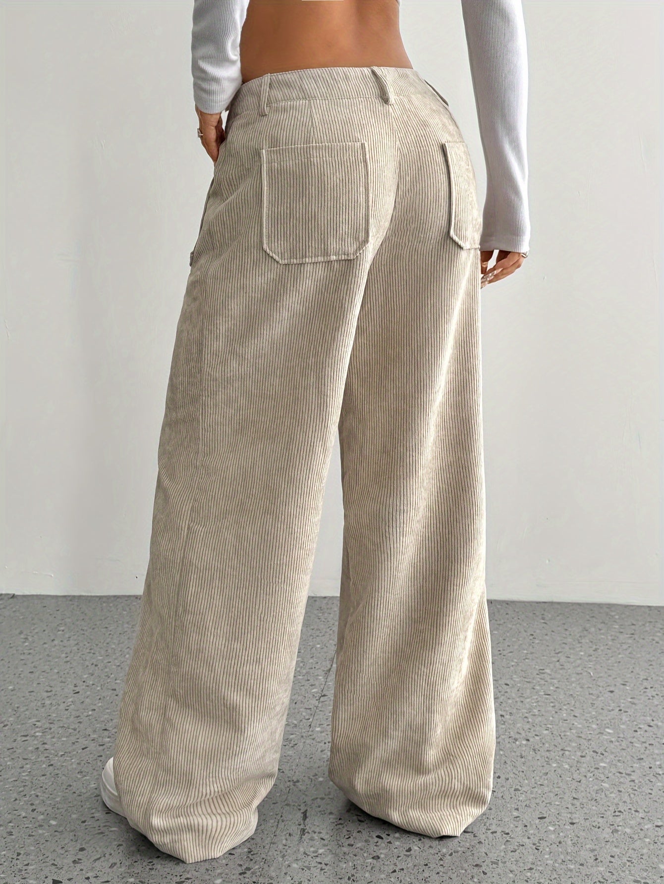 Casual corduroy wide leg pants for women made of polyester, suitable for all seasons.