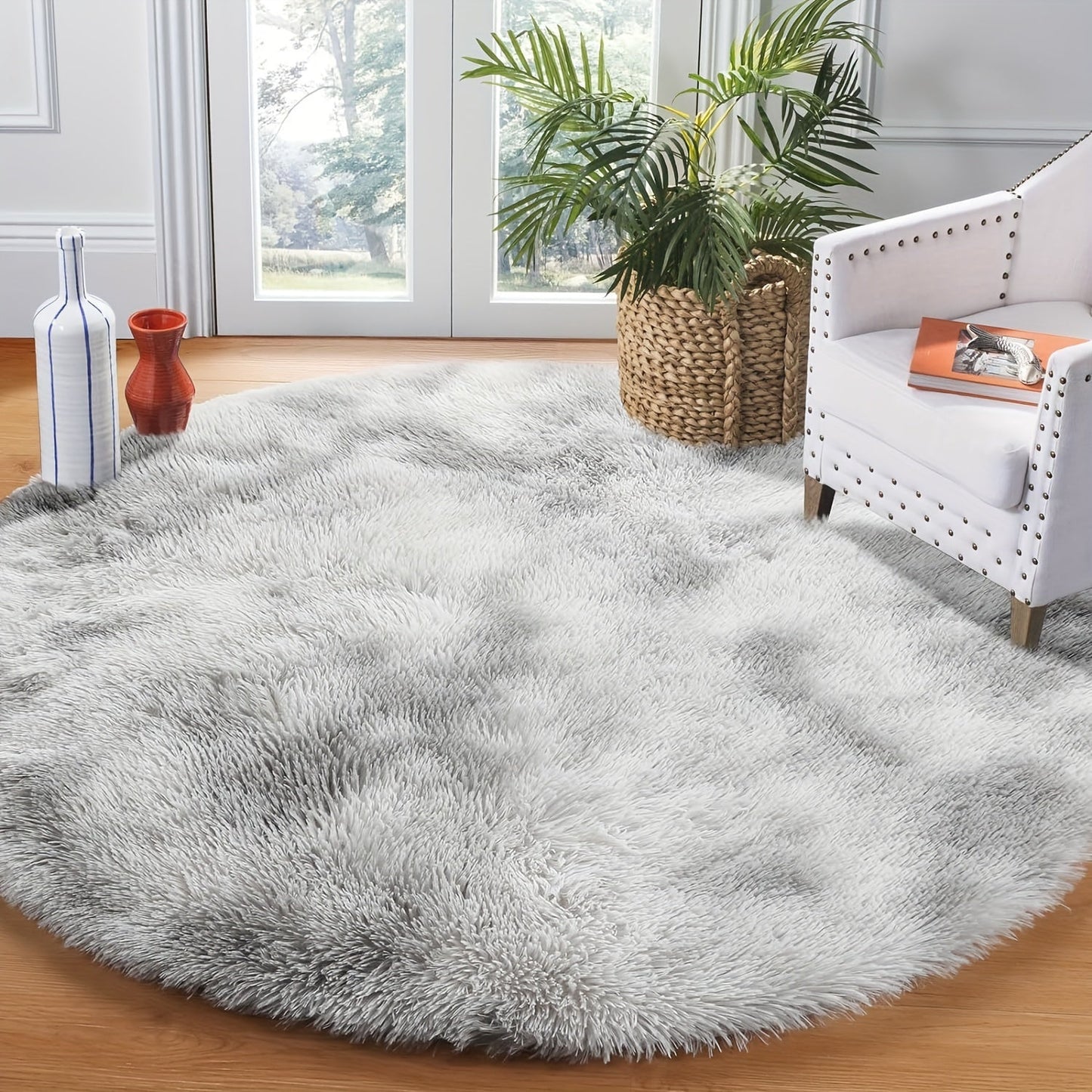 1 piece of a round, fresh, and simple tie-dye light grey plush rug. Made from super soft premium fabric that is furry and skin-friendly, this decorative rug has upgraded fabric with fluffy sponge, thickened, and no shed. It is firm, durable, lightweight