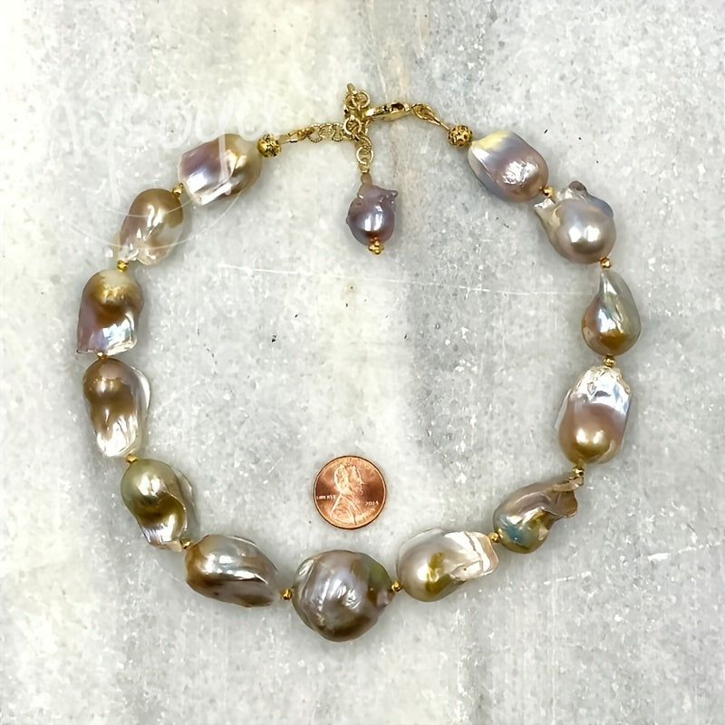 Handcrafted MYSOYA Baroque Pearl Necklace featuring 100% natural freshwater pearls ranging from 21-28mm. This elegant and luxurious jewelry piece is perfect for everyday wear, weddings, and special occasions. Makes a stunning Valentine's Day gift or June