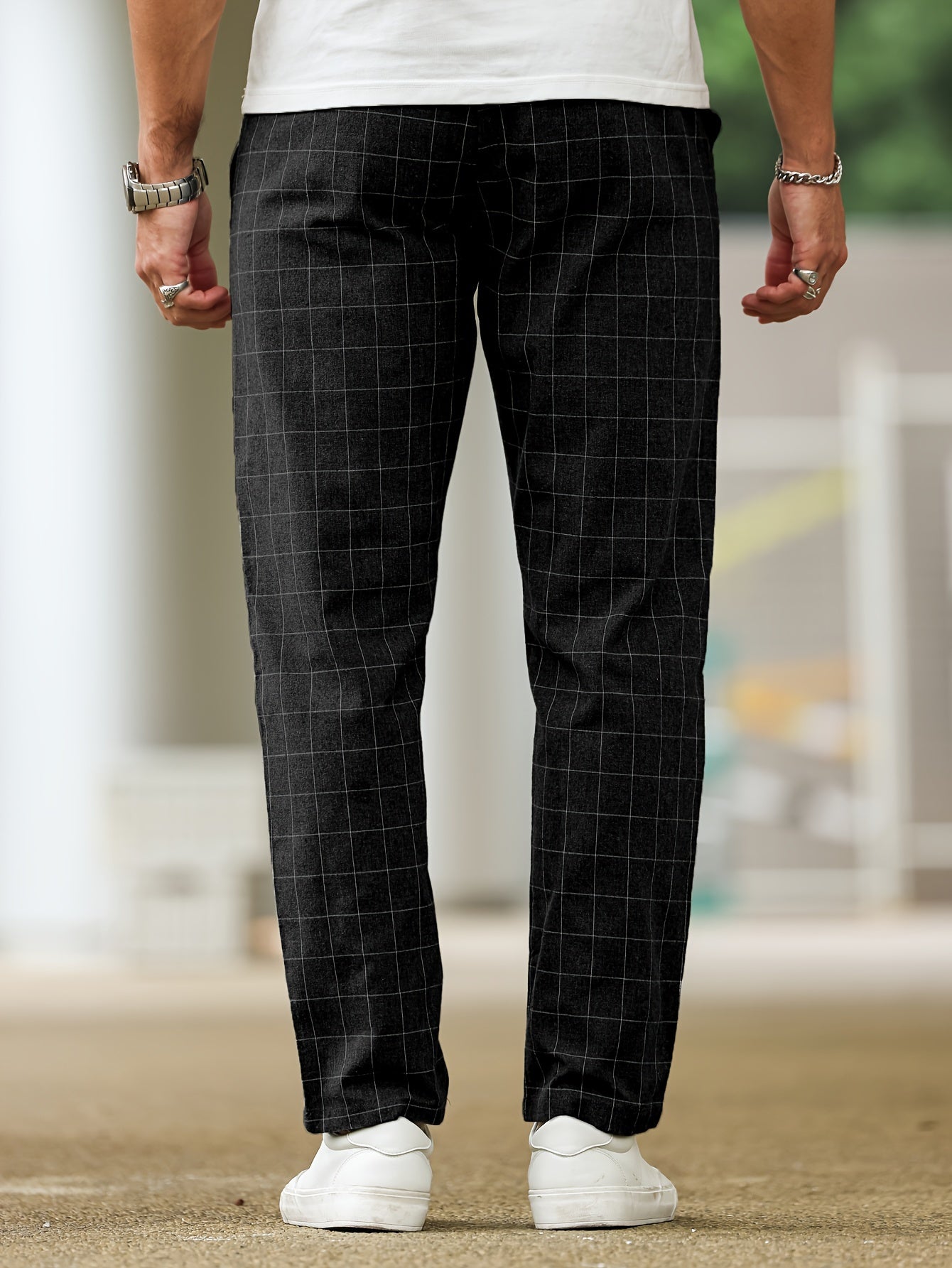 Men's polyester pants with drawstring waist, ideal for spring and fall, featuring casual striped plaid pattern.