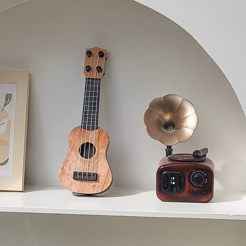 Mini playable uke instrument figurine made of plastic for home and office decor, ideal gift for music enthusiasts.