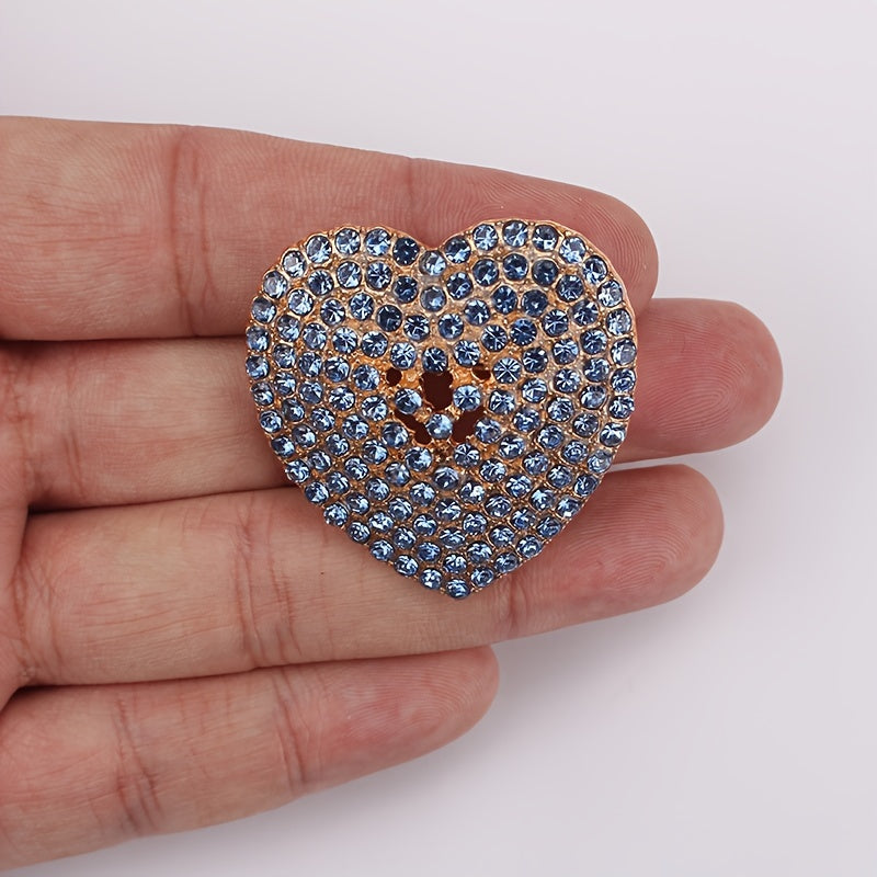 Heart-shaped brooch embellished with sparkling rhinestones - a stylish lapel pin for women's attire, perfect for adding charm to dresses, coats, sweaters, and corsages.