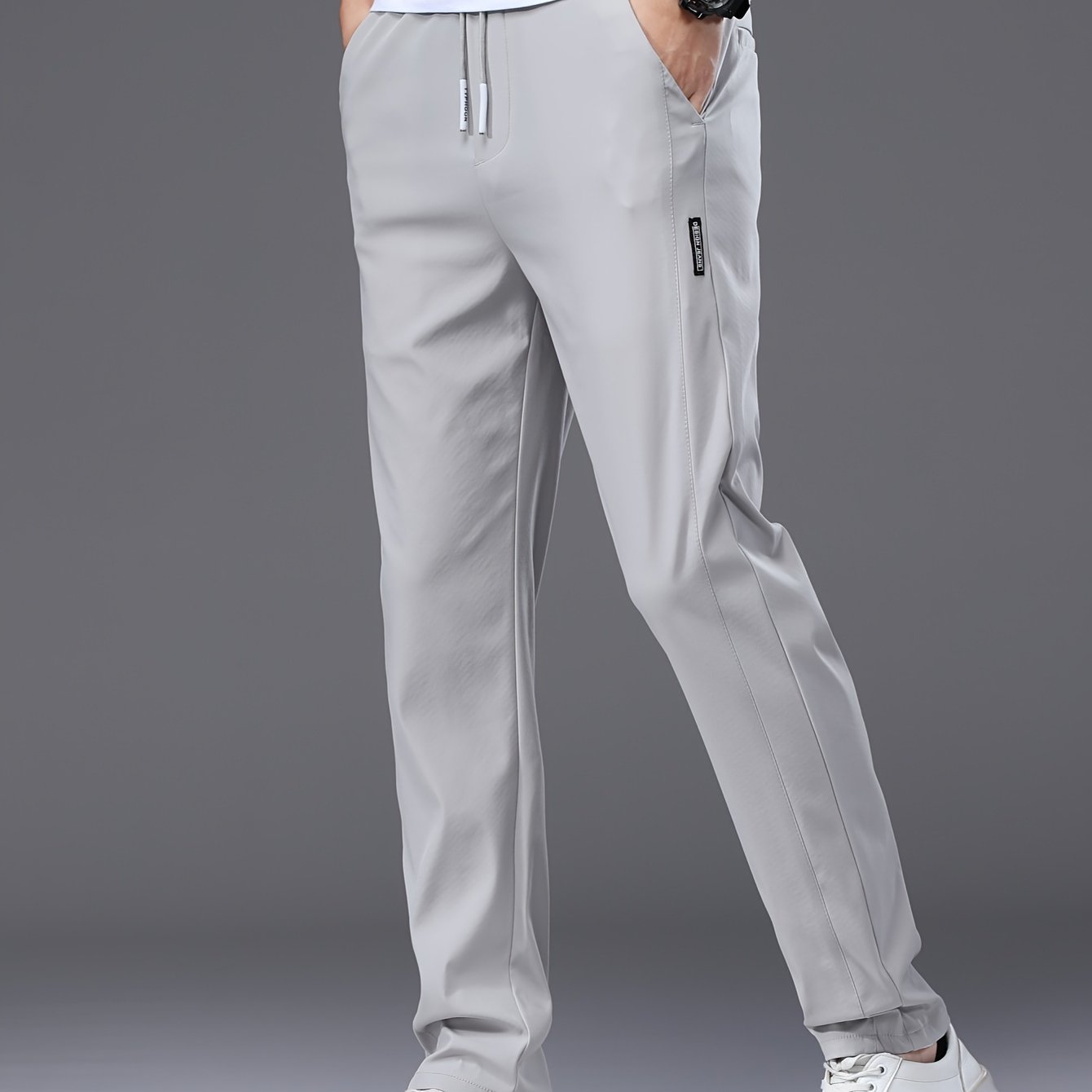 Men's slim fit drawstring sports pants, lightweight quick-dry trousers for summer leisure wear.